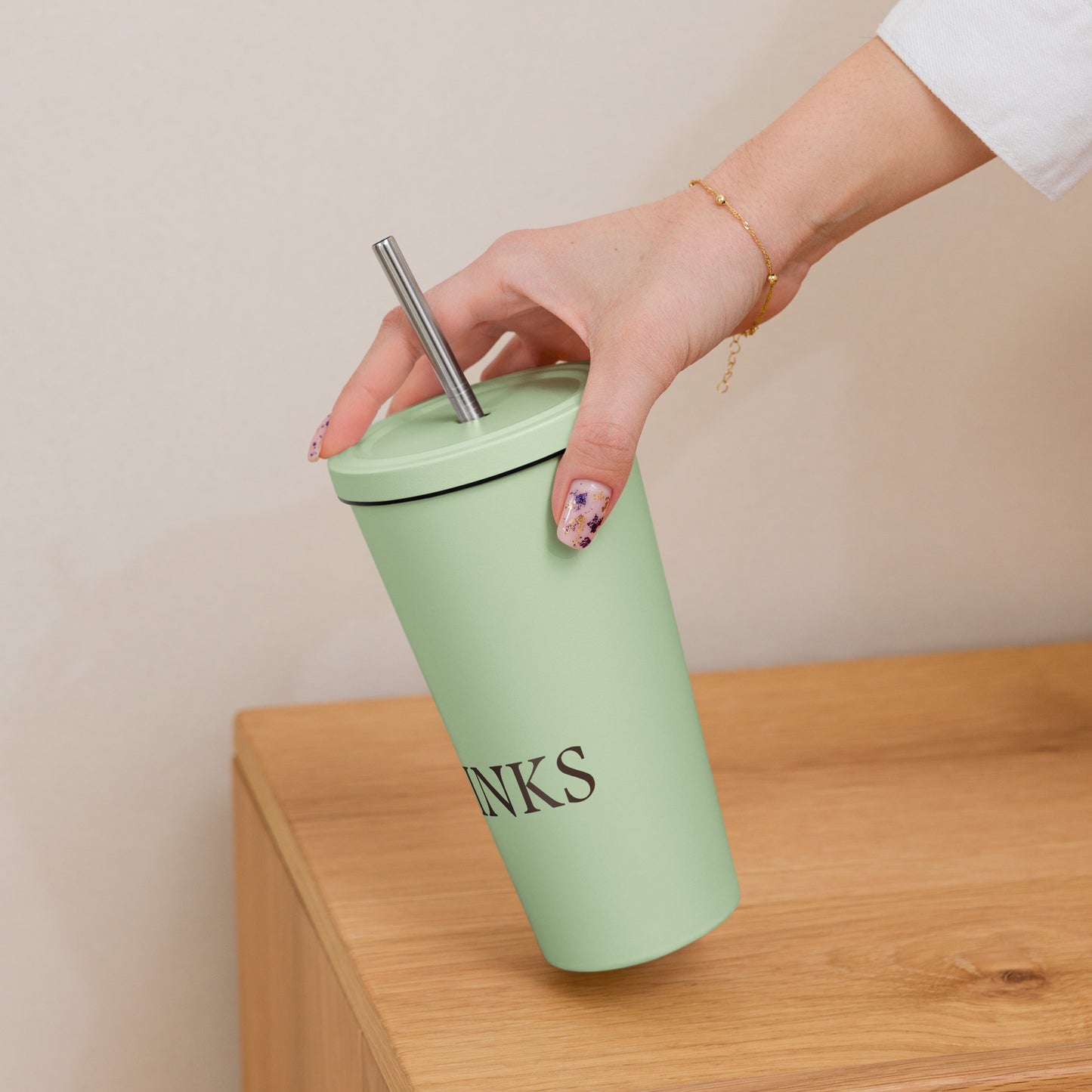 Insulated tumbler with a straw